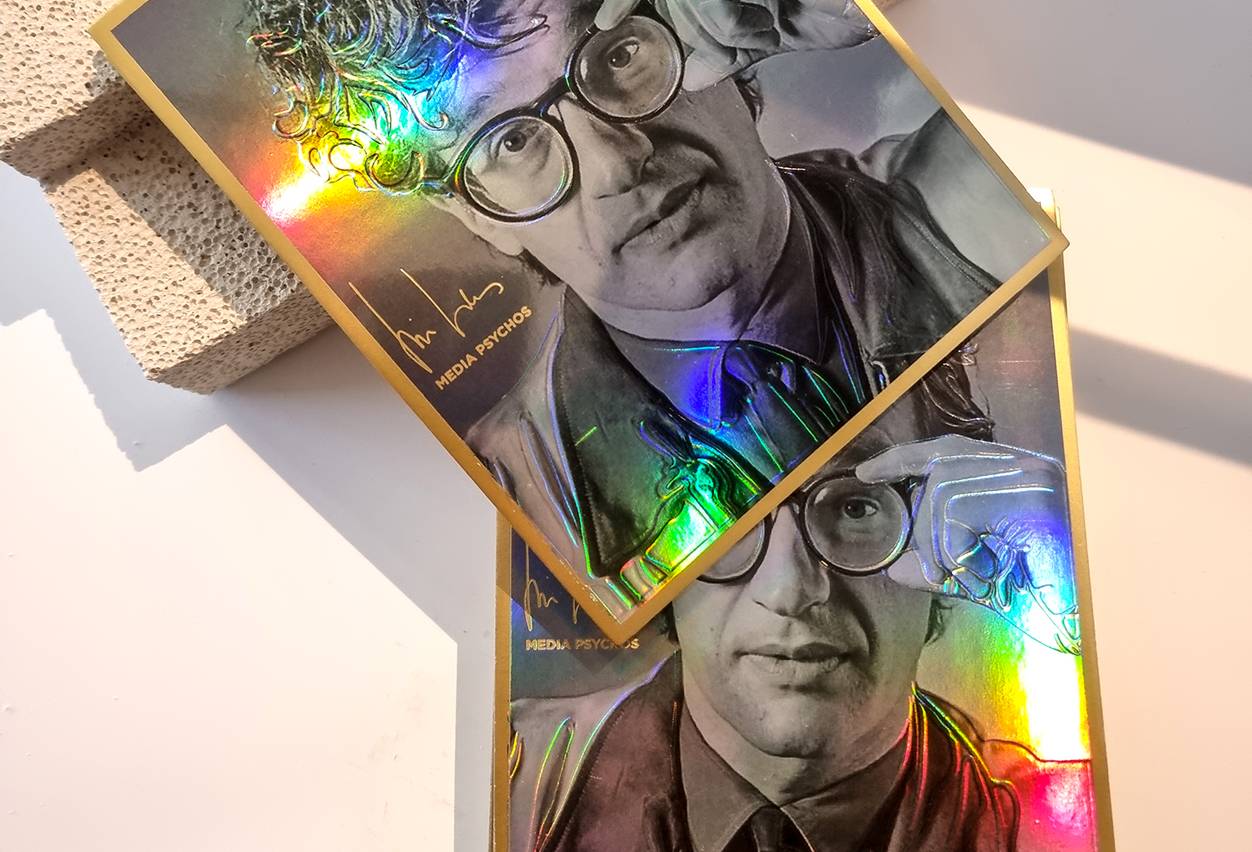 A gilded card with Spot UV finish - An ideal finish for luxury boxes in Singapore